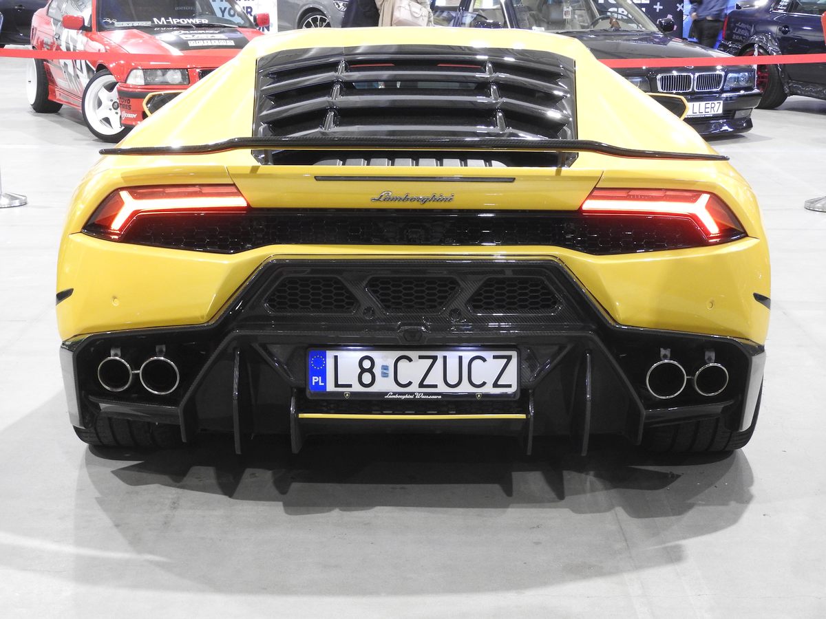 115y23