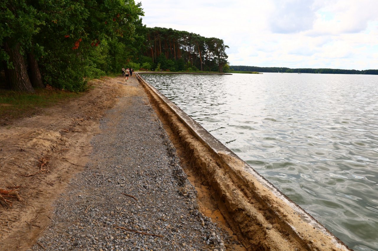 143i56